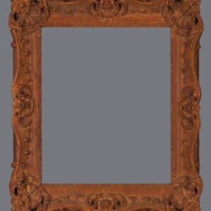 A picture frame with an ornate design on it.