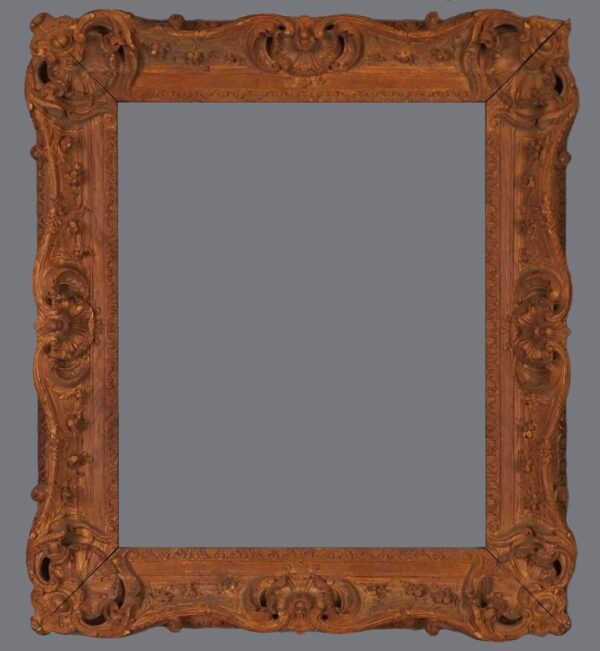 A picture frame with an ornate design on it.