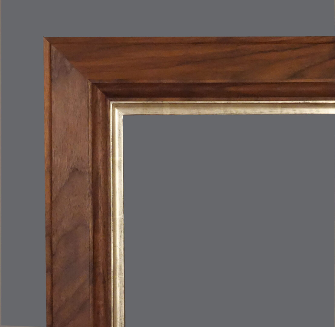 A picture frame with a silver metal trim.