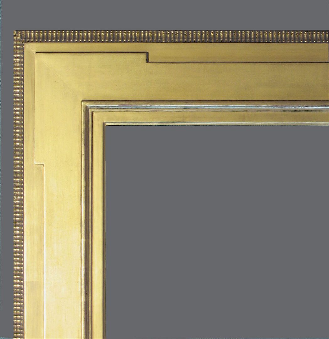 A group of three gold frames with different sizes.