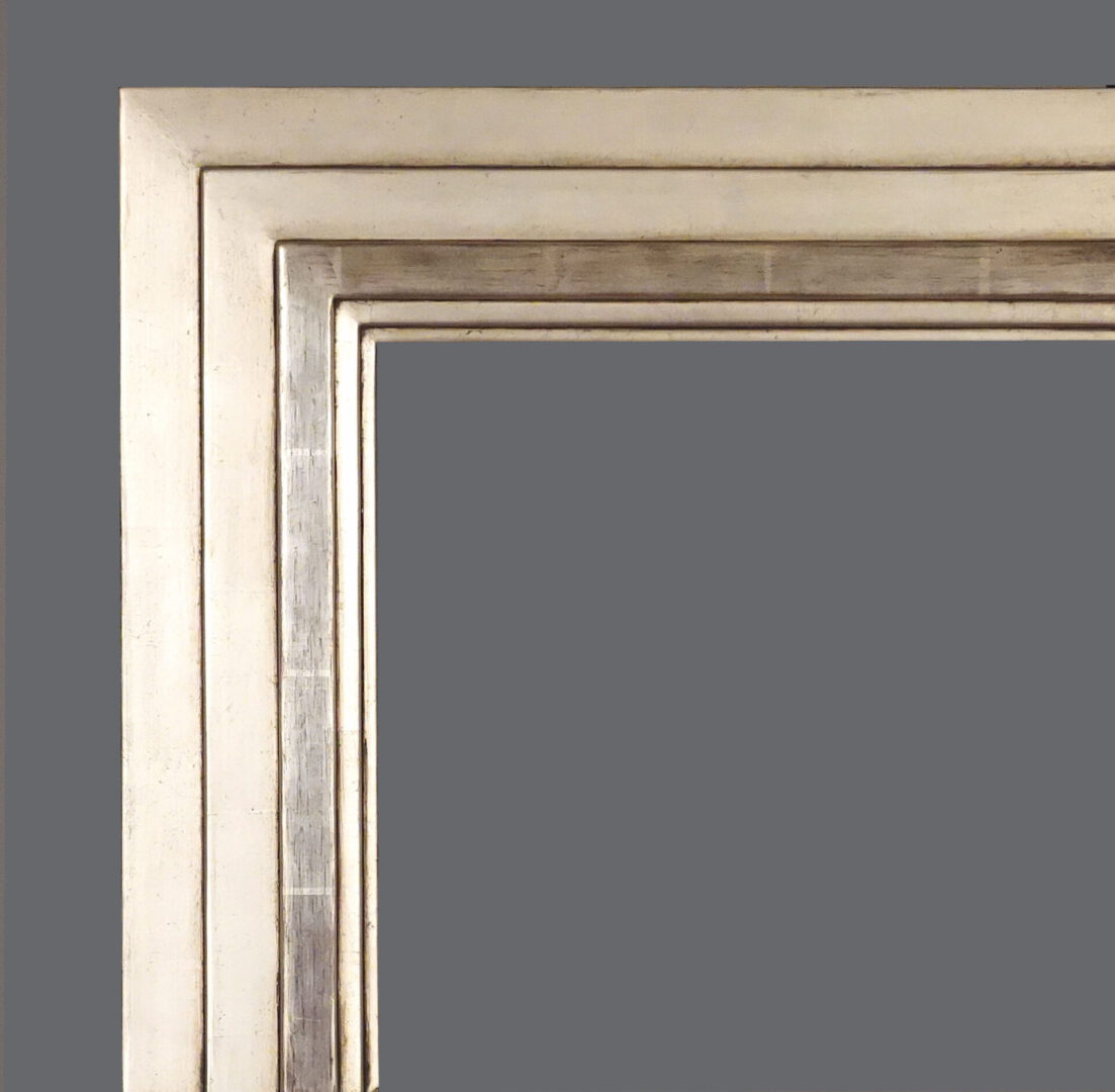 A silver picture frame with gray background