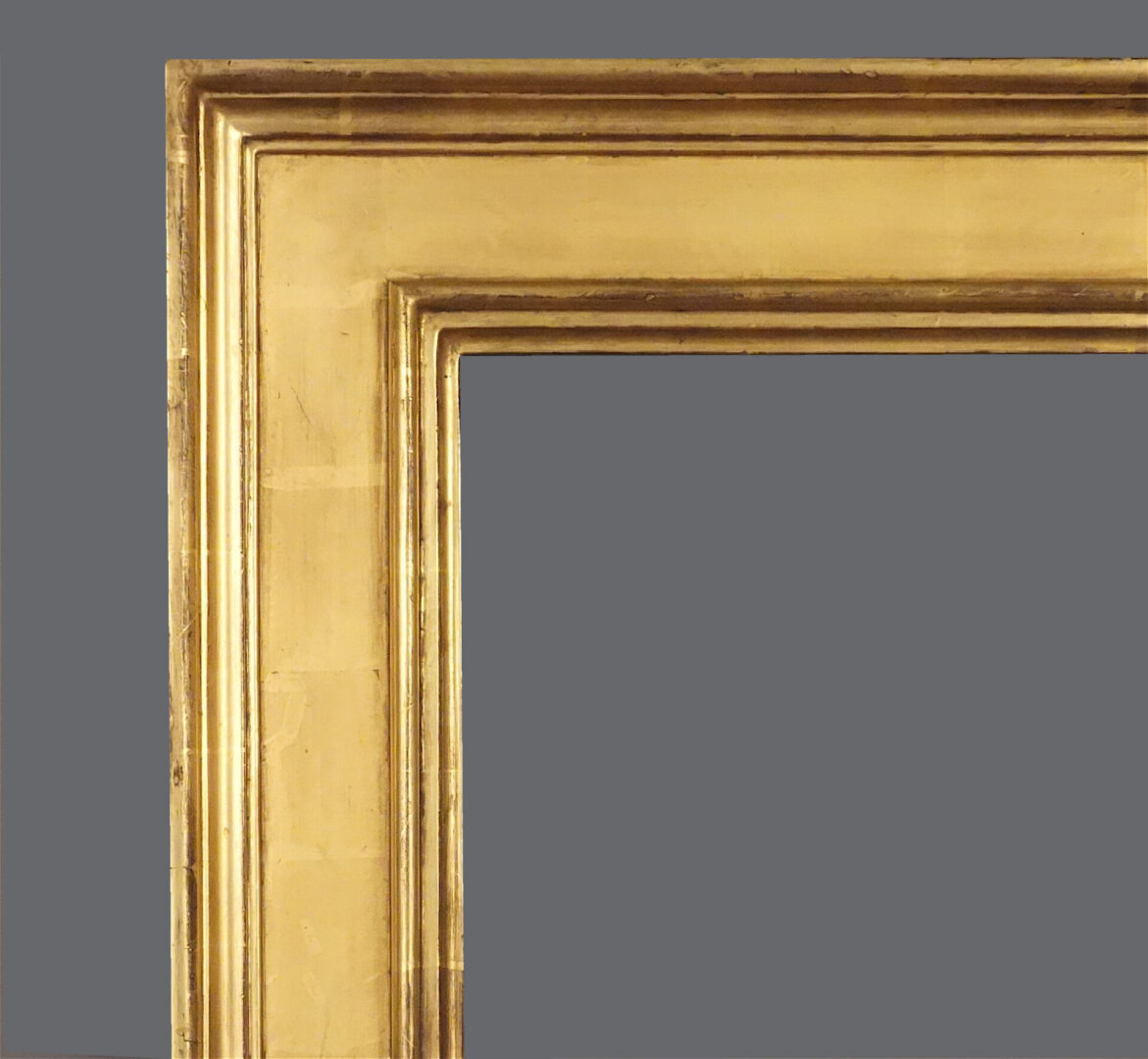 A gold frame with gray background