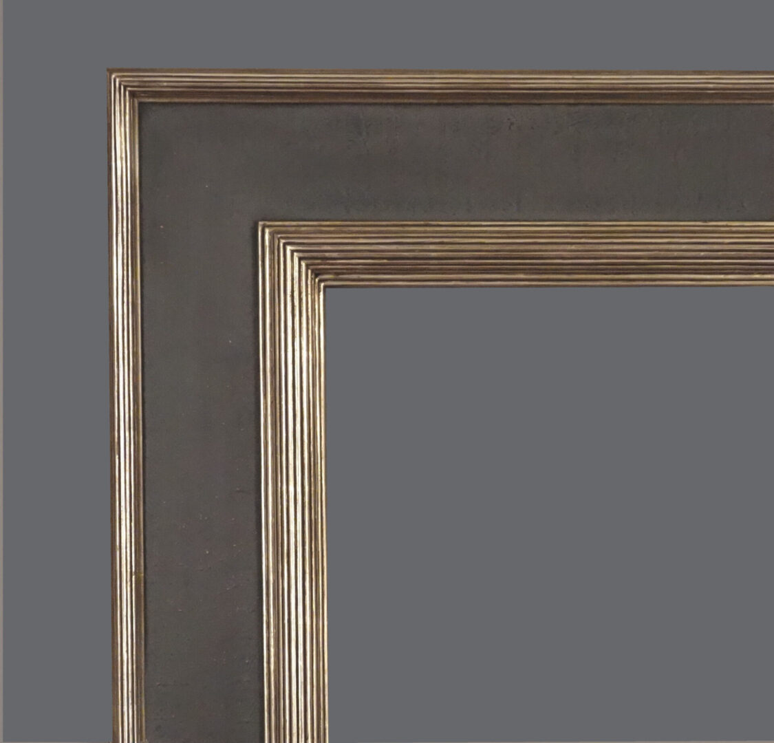 A picture frame with a gray background and gold trim.