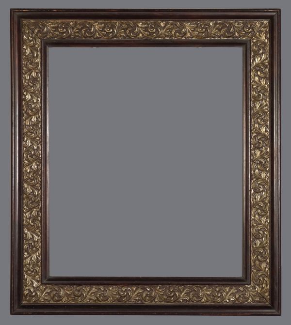 A picture frame with gold leaf on the front of it.