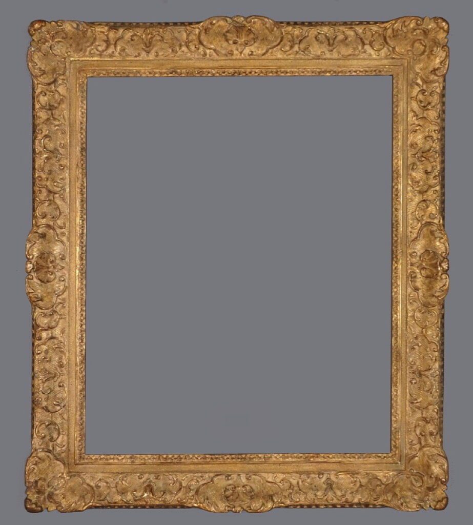 A picture frame with a gold leaf finish.