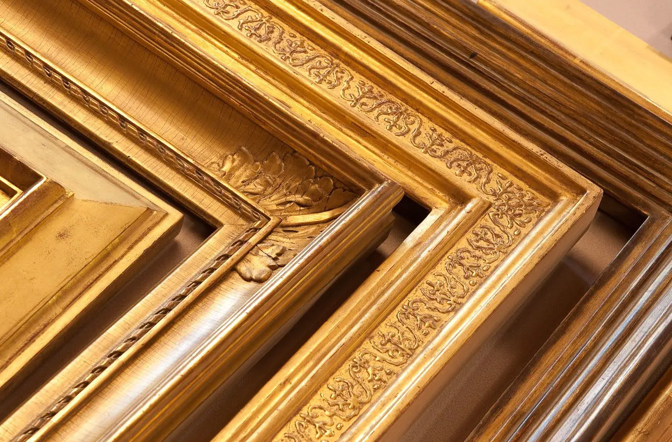 A close up of some gold frames