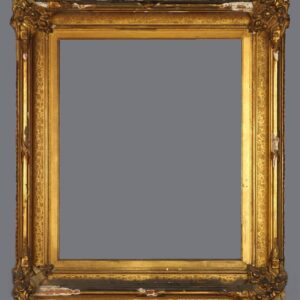 A gold frame with some ornate designs on it