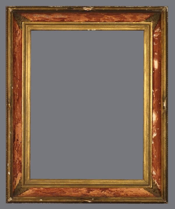 A picture frame with a gold trim and red background.