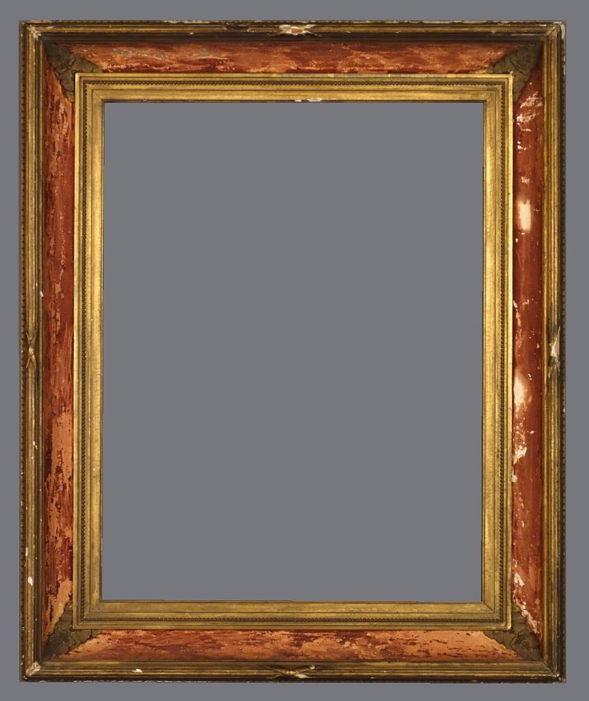 A picture frame with a gold trim and red background.