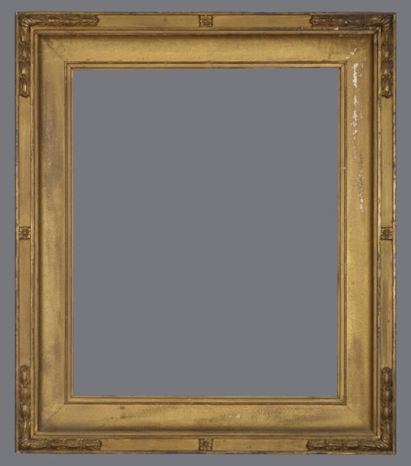 A picture frame with a gold leaf finish.