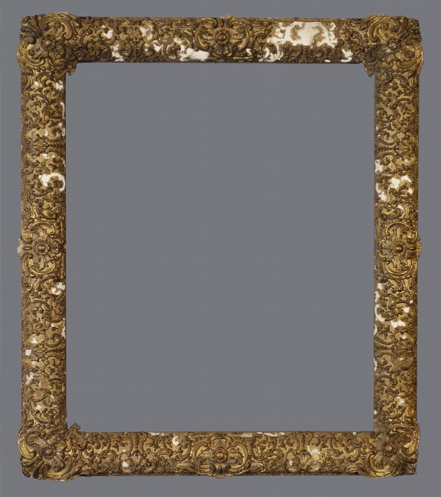 A picture frame made of gold leaf.