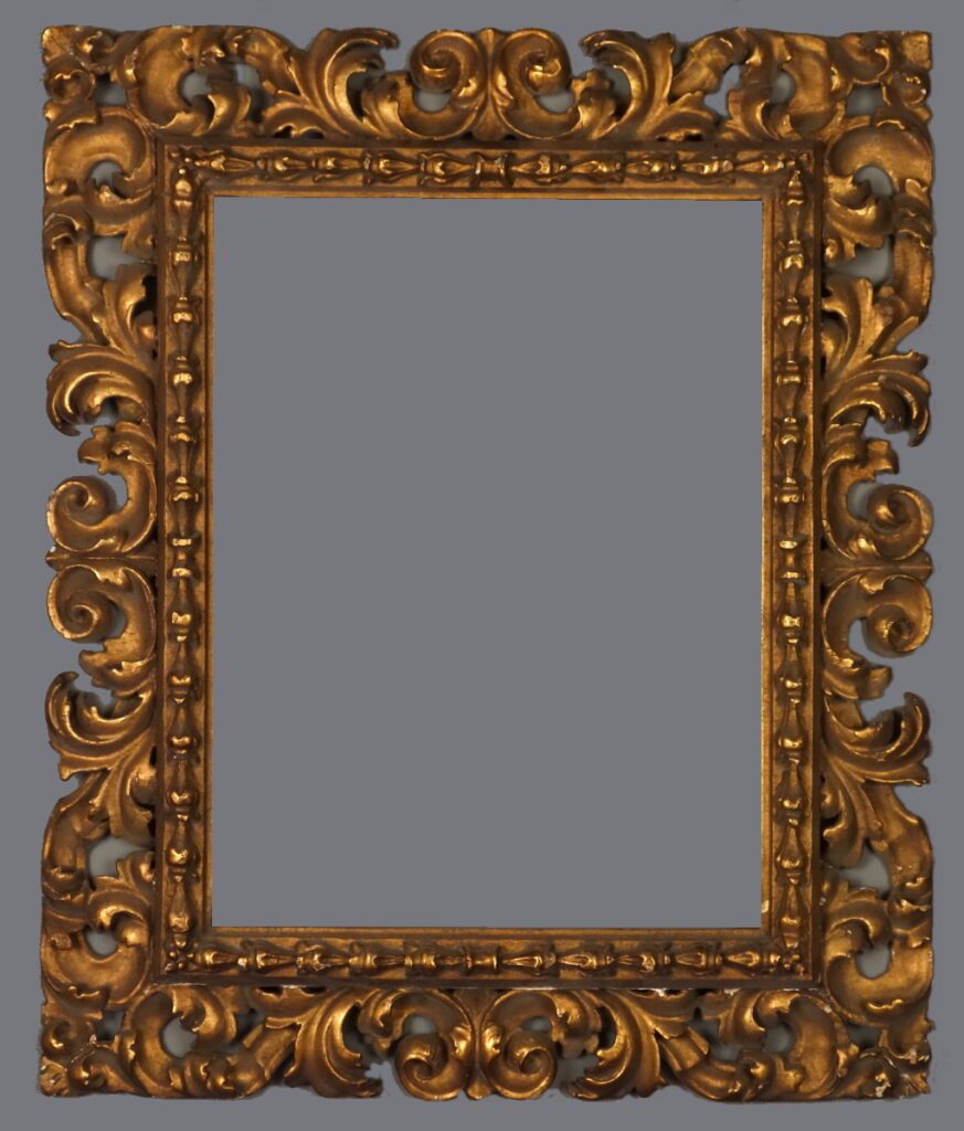 A picture frame with gold leaf and ornate design.