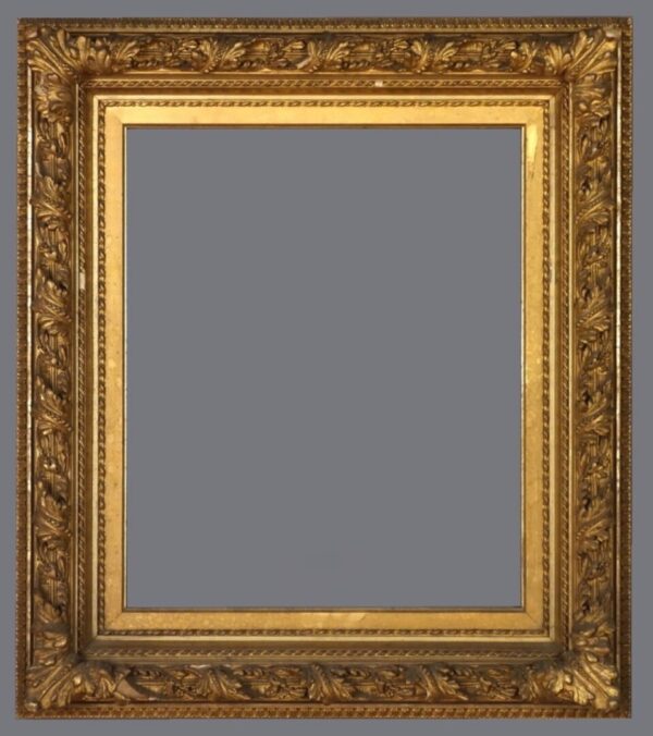 A picture frame with gold leaf and a gray background.