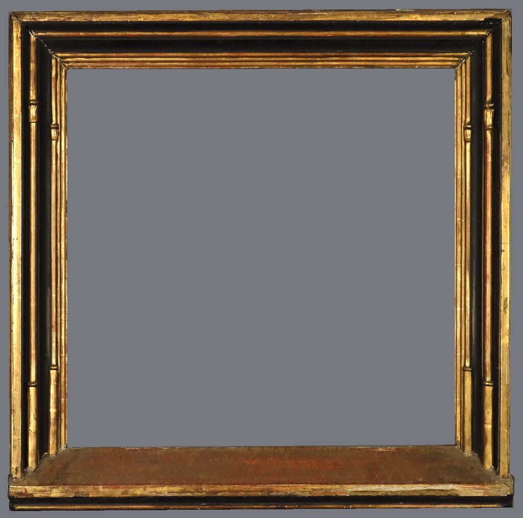 A picture frame with the bottom of it open.