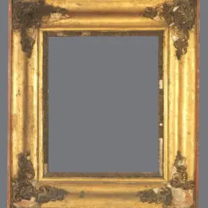 A gold frame with some flowers on it