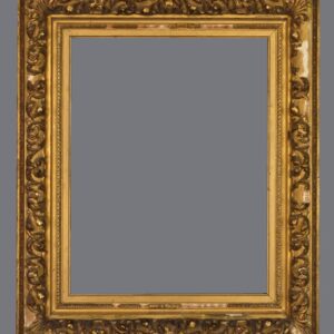 A picture frame with gold leaf and a gray background.