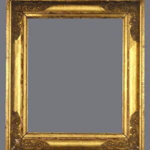 A picture frame with gold leaf and a gray background.