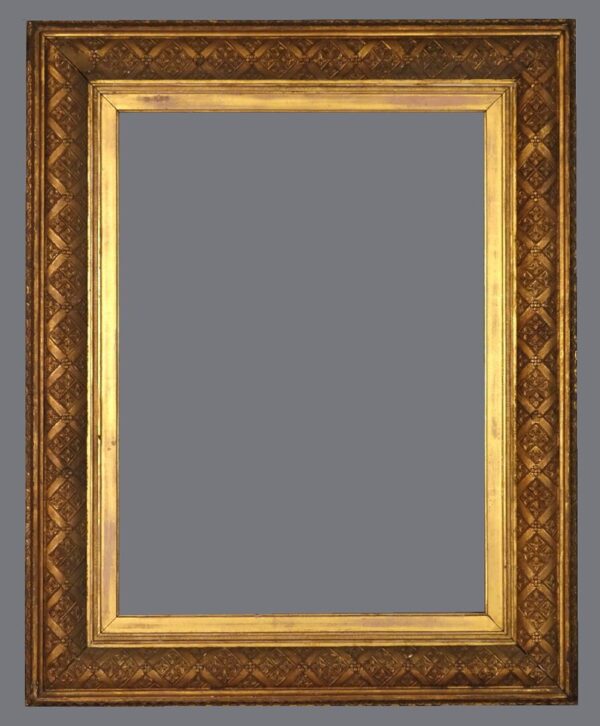 A picture frame with a gold leaf border.