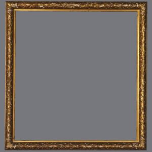 A picture frame with gold trim and gray background.