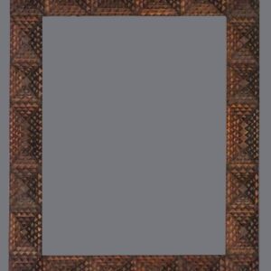 A picture frame with an intricate design on it.