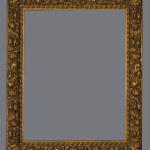 A picture frame with gold leaf and a gray background.