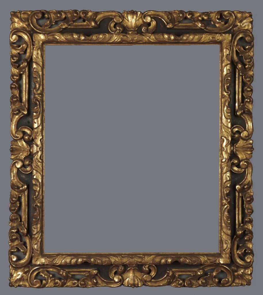 A picture frame with gold leaf and black trim.