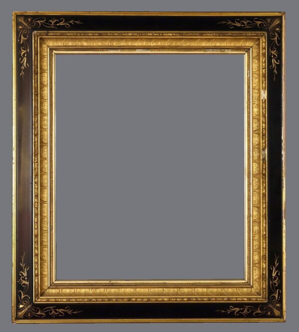 A picture frame with a black and gold border.