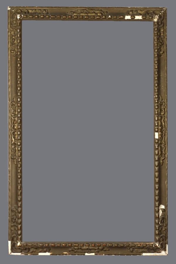 A picture frame with a lot of gold trim.