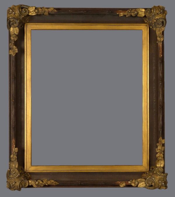 A picture frame with gold leaf trim and a gray background.