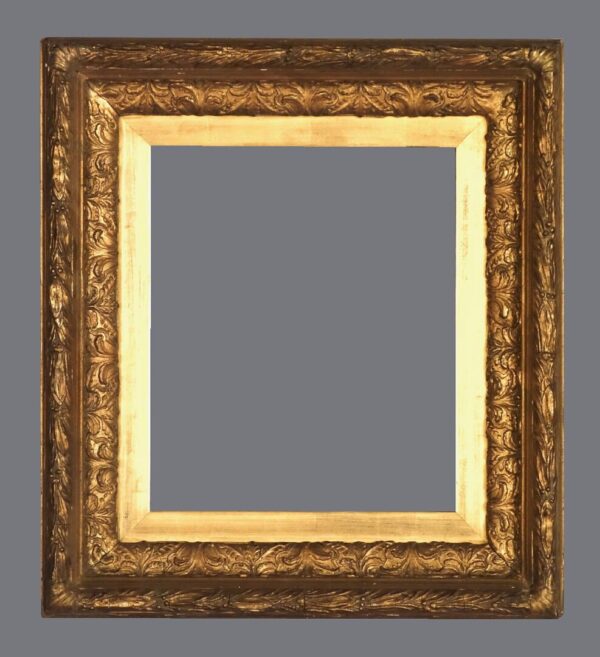 A picture frame with gold leaf and a gray background.