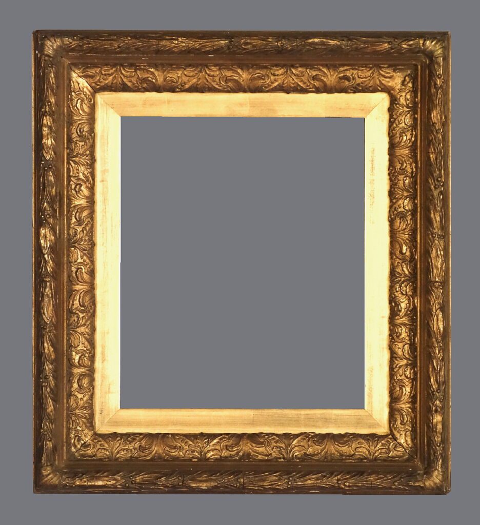 A picture frame with gold leaf and a gray background.