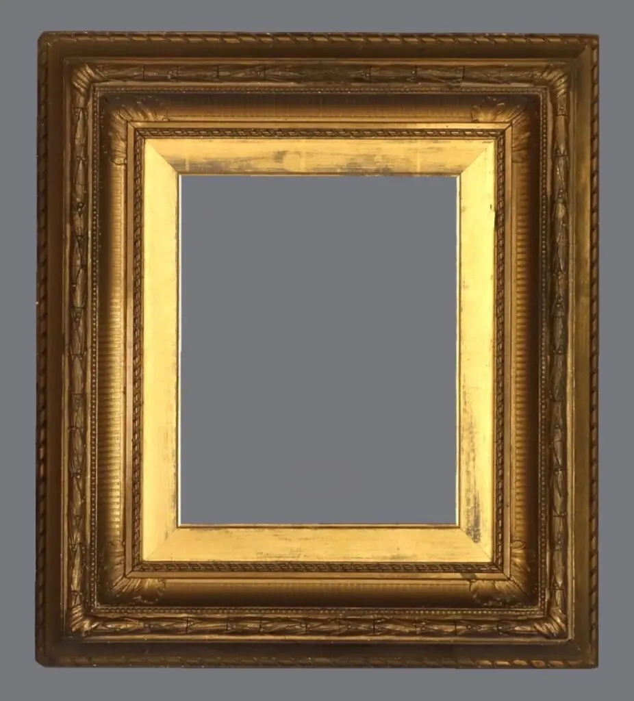 A picture frame with a gold leaf finish.