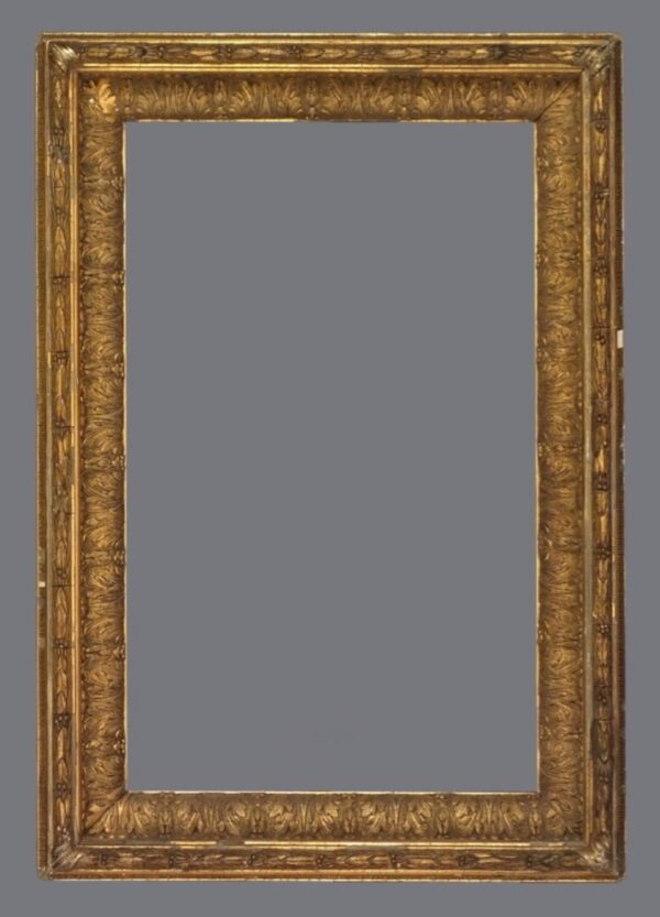 A large gold frame with gray background