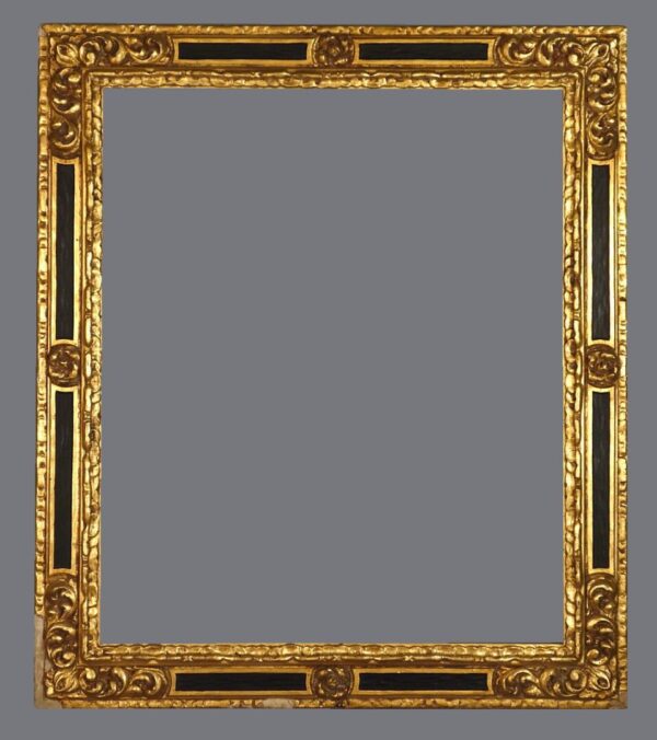 A gold frame with black and brown trim.