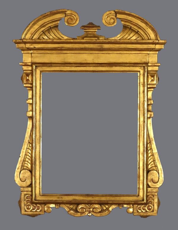 A gold frame with a large mirror on the side.