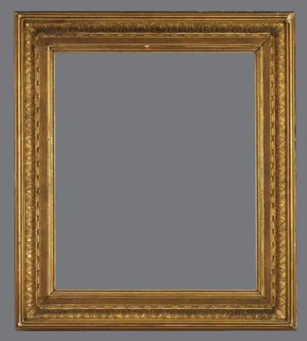 A picture frame with gold leaf and a gray background.