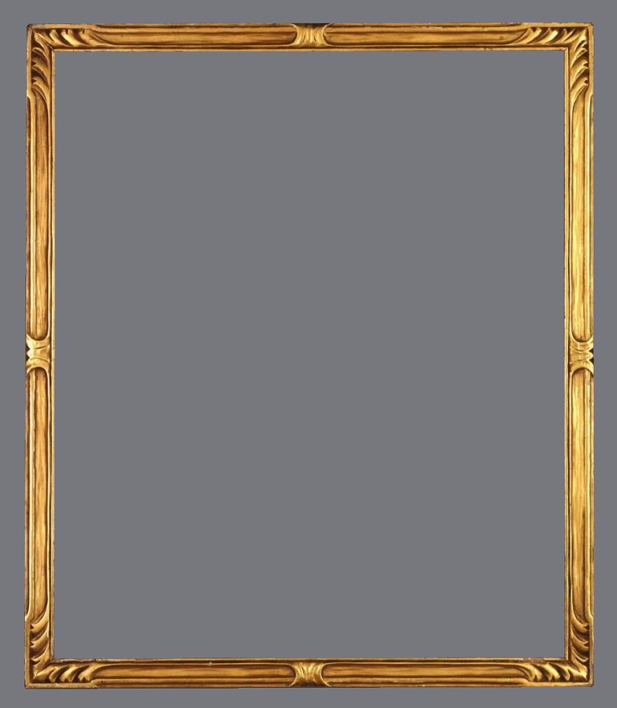 A picture frame with an ornate gold finish.