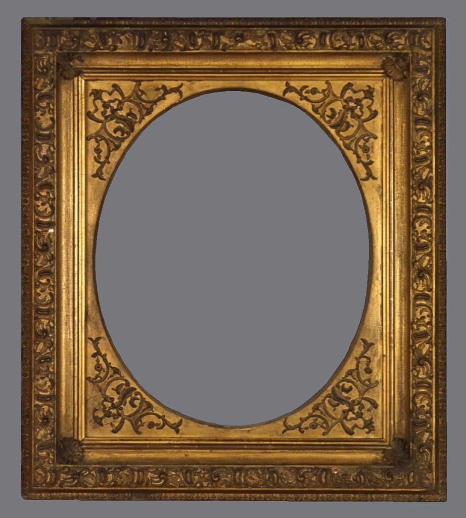 A gold frame with a floral design on it.