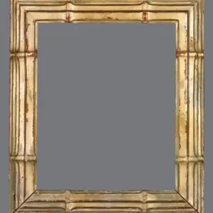 A picture frame with gold paint and bamboo design.