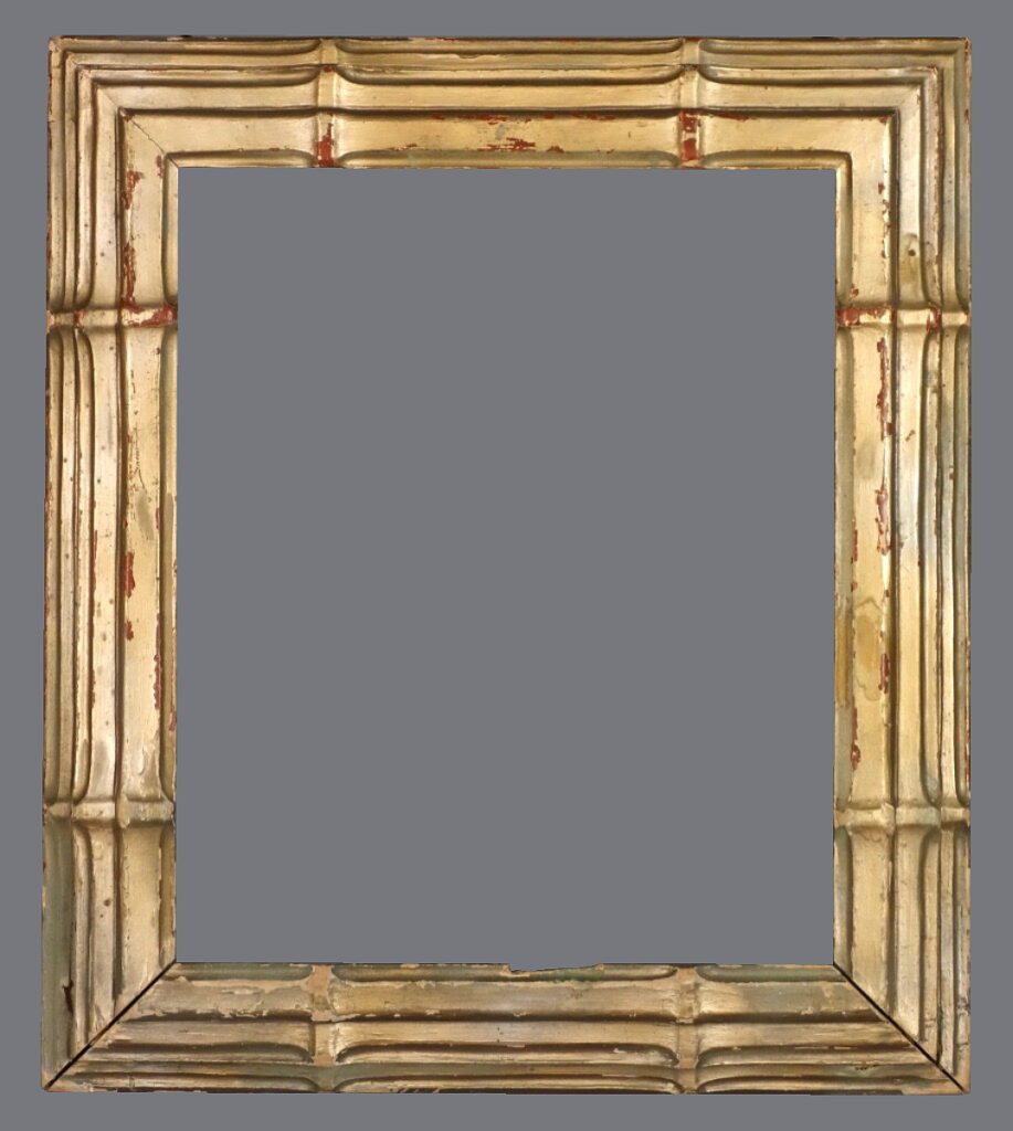 A picture frame with gold paint and bamboo design.