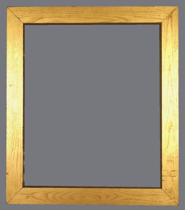 A picture frame with a gray background and some wood.