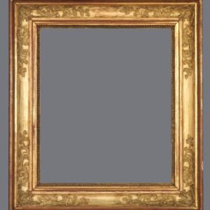 A picture frame with gold leaf and a gray background.