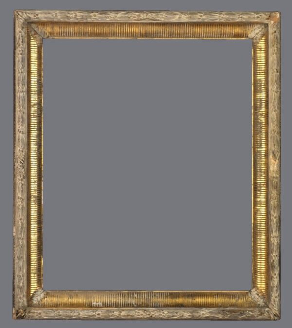 A picture frame with gold leaf on the edges.