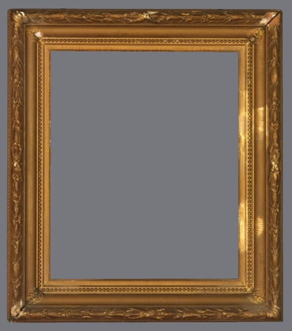 A picture frame with gold leaf and a gray background.