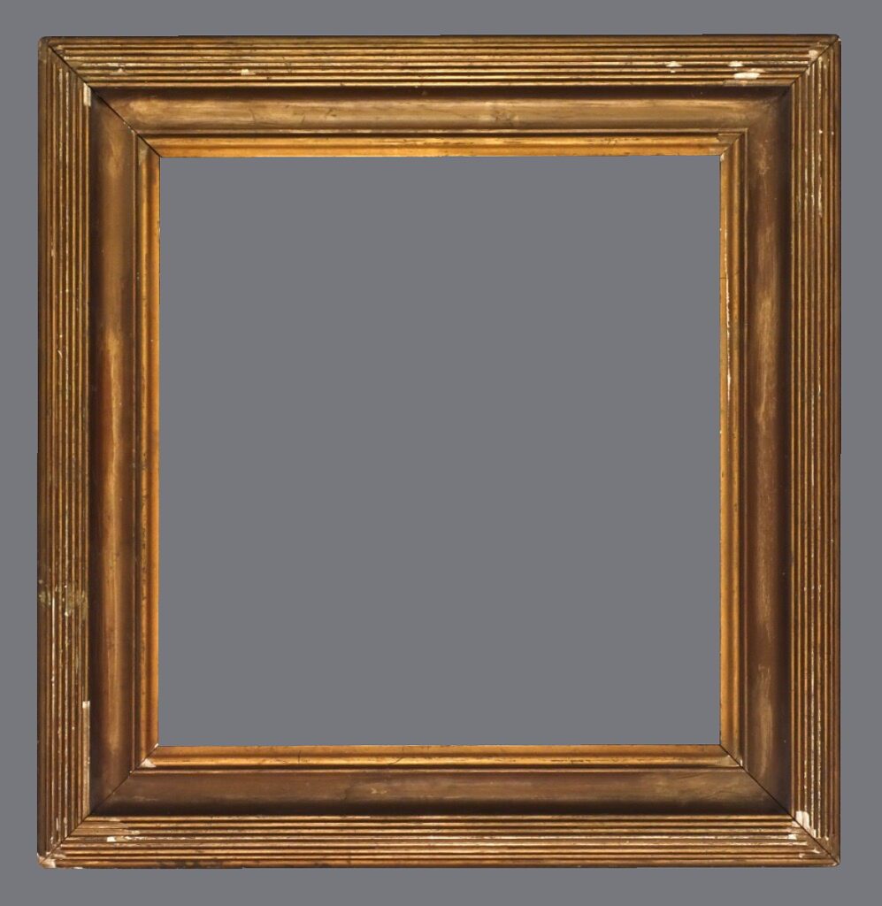 A picture frame with no glass.