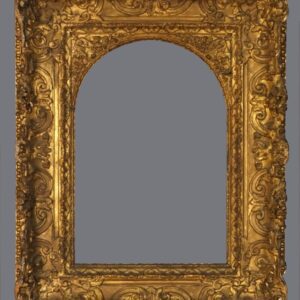 A gold frame with a large arch in the middle.