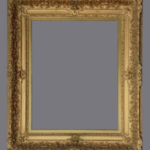 A picture frame with gold leaf and a gray background.