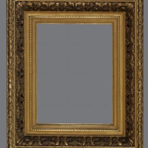 A picture frame with gold leaf and black trim.