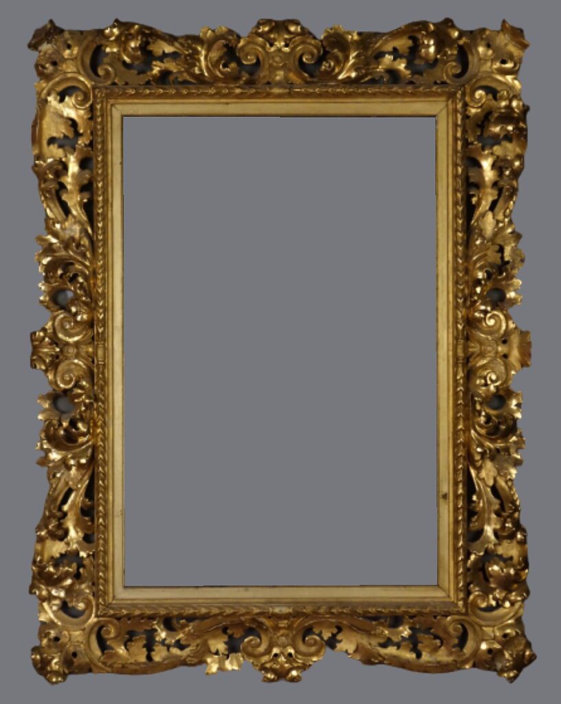 A gold frame with some faces on it