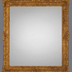 A mirror with a gold frame and gray background